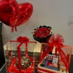 A Bouquet of Roses with a Chocolate Cake