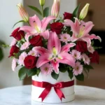 The Elegance of Crimson Lilies with Red Roses