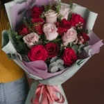 Bouquet of mixed roses and eucalyptus