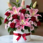 The elegance of crimson lilies with red roses